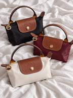 LONGCHAMP MINI POUCH WITH HANDLE