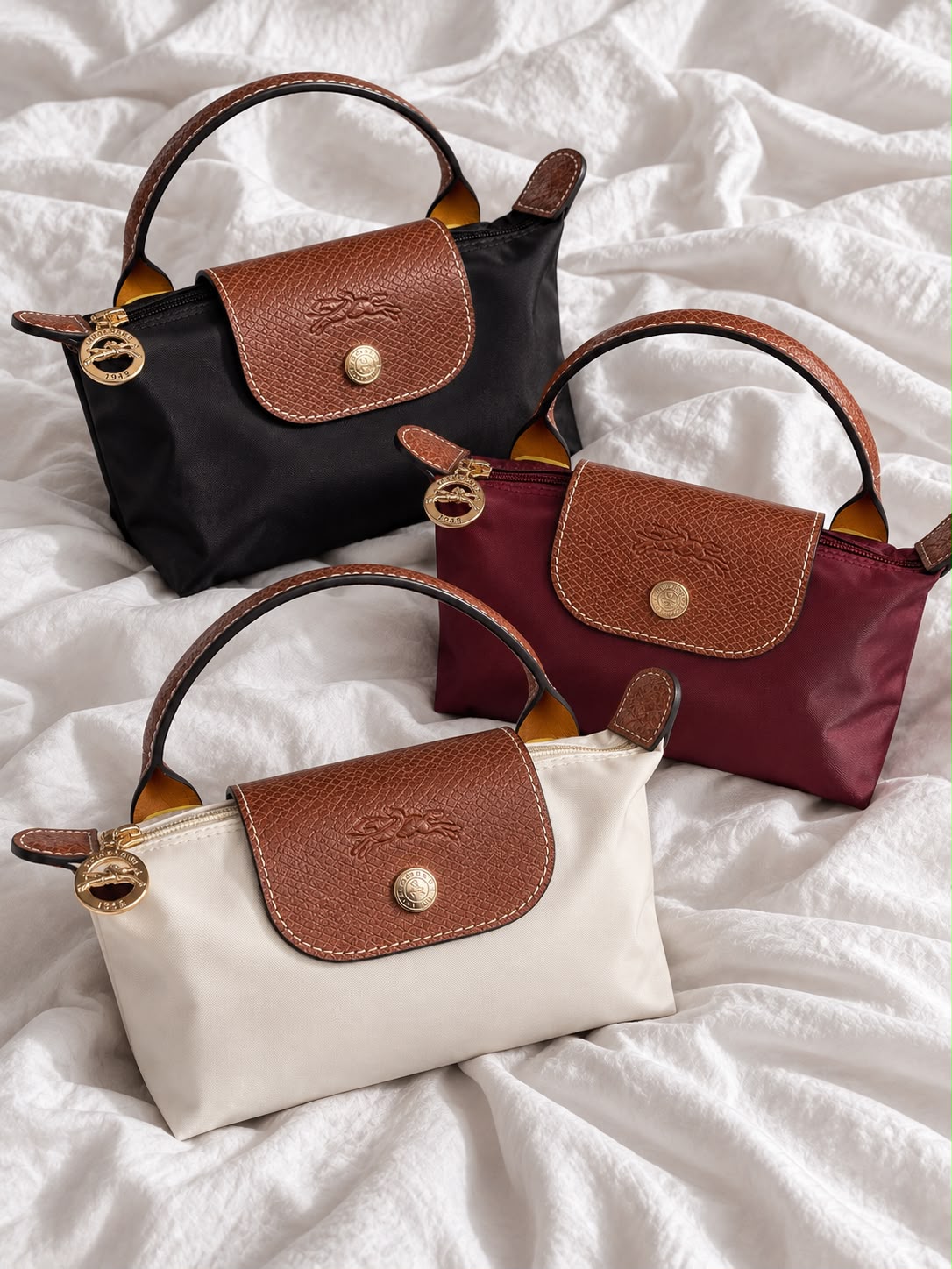 LONGCHAMP MINI POUCH WITH HANDLE