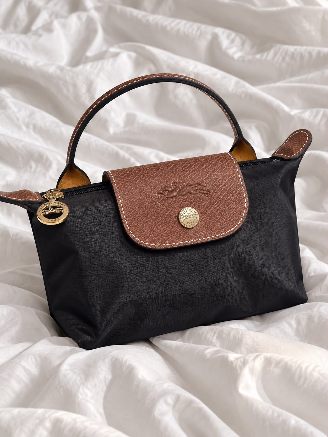 LONGCHAMP MINI POUCH WITH HANDLE
