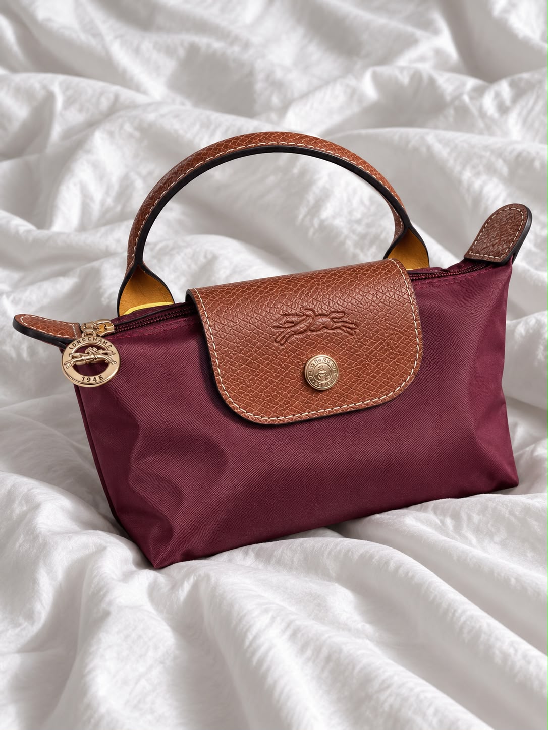 LONGCHAMP MINI POUCH WITH HANDLE